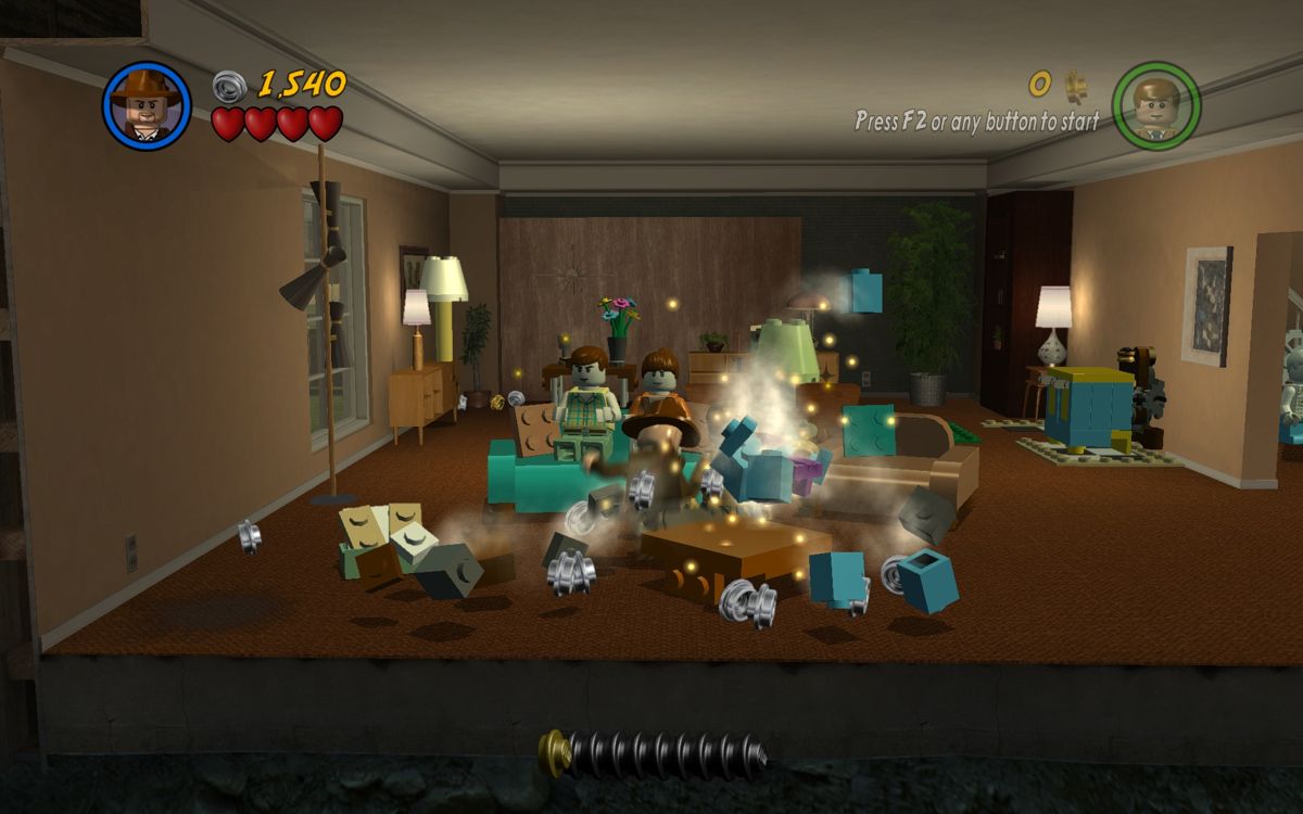 LEGO Indiana Jones 2: The Adventure Continues (Windows) screenshot: Destroying the home of these dummies - they don't need anything anyway.