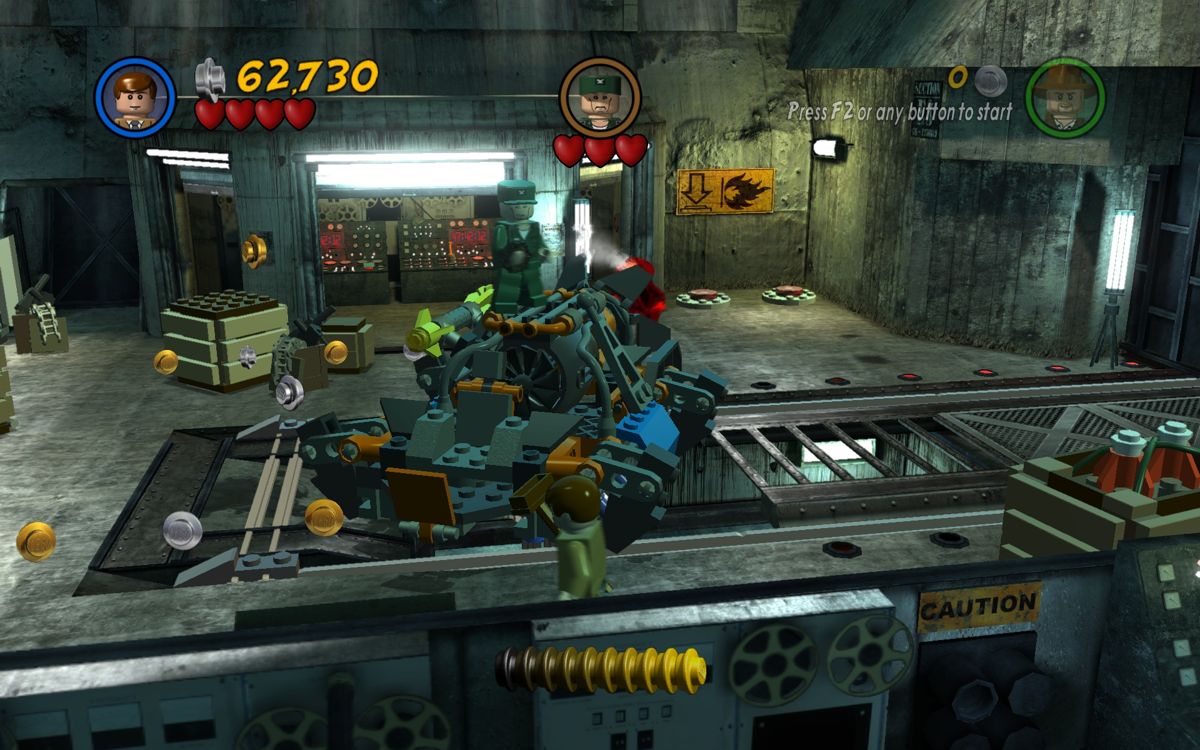 LEGO Indiana Jones 2: The Adventure Continues (Windows) screenshot: Fighting a boss under Area 51.
