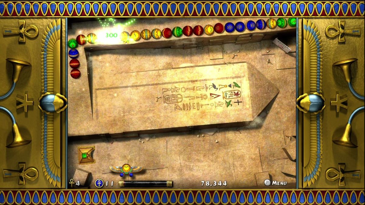 Luxor 2 (Xbox 360) screenshot: Clear out all the balls before they reach your pyramid.