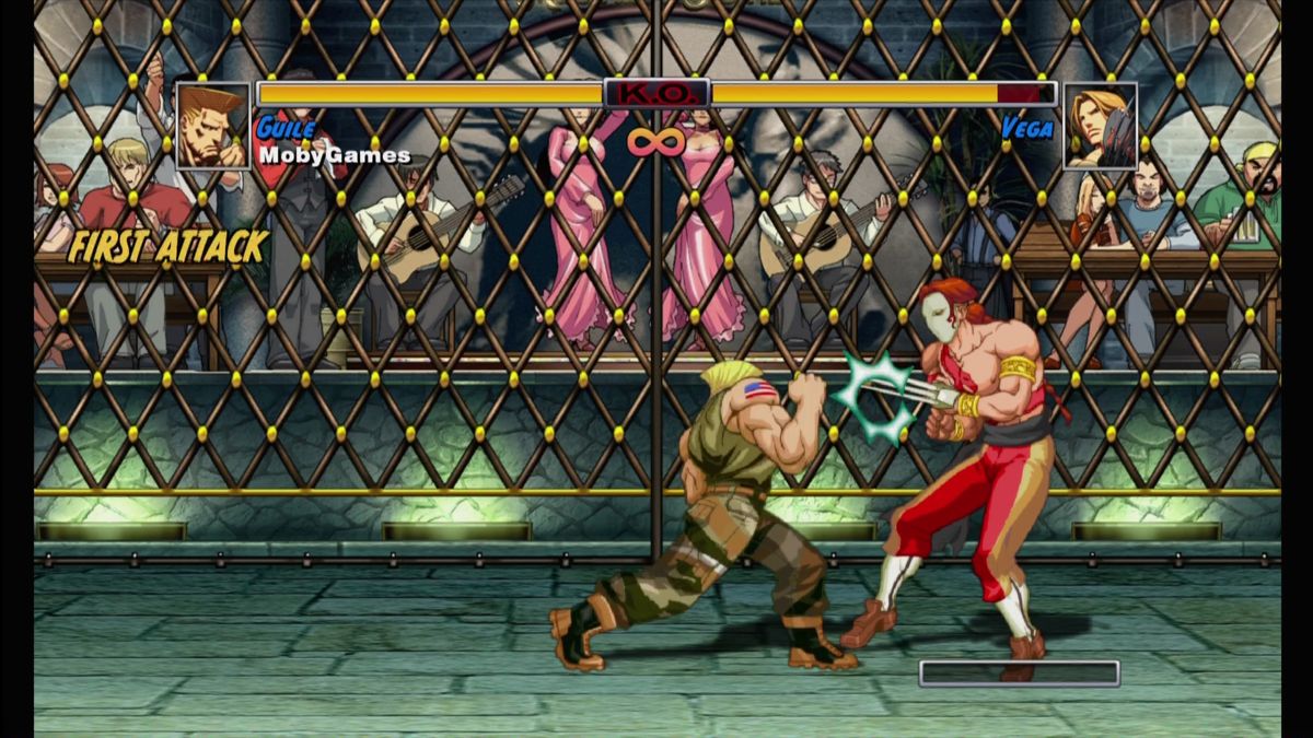 Super Street Fighter II Turbo: HD Remix (Xbox 360) screenshot: Guile vs Vega in Spain.