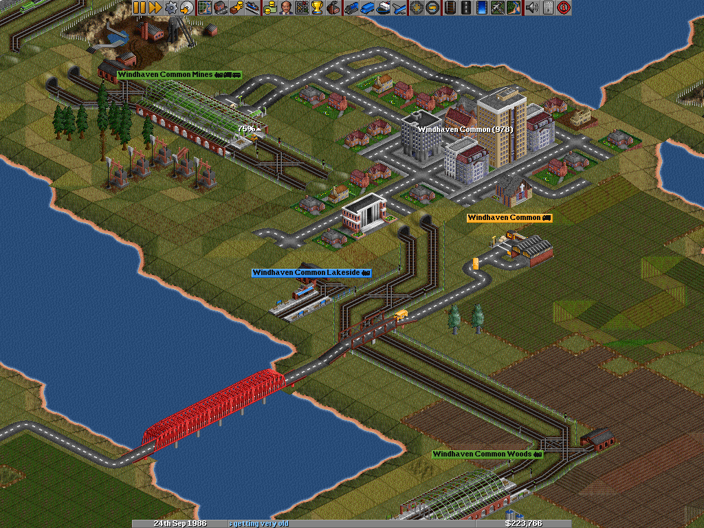 OpenTTD (Windows) screenshot: A red bridge