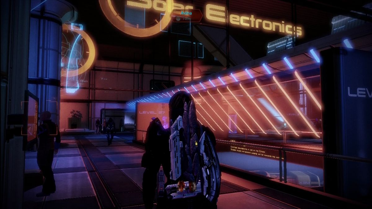 Mass Effect 2 (Xbox 360) screenshot: Plenty of stores on the Citadel for your upgrading needs.