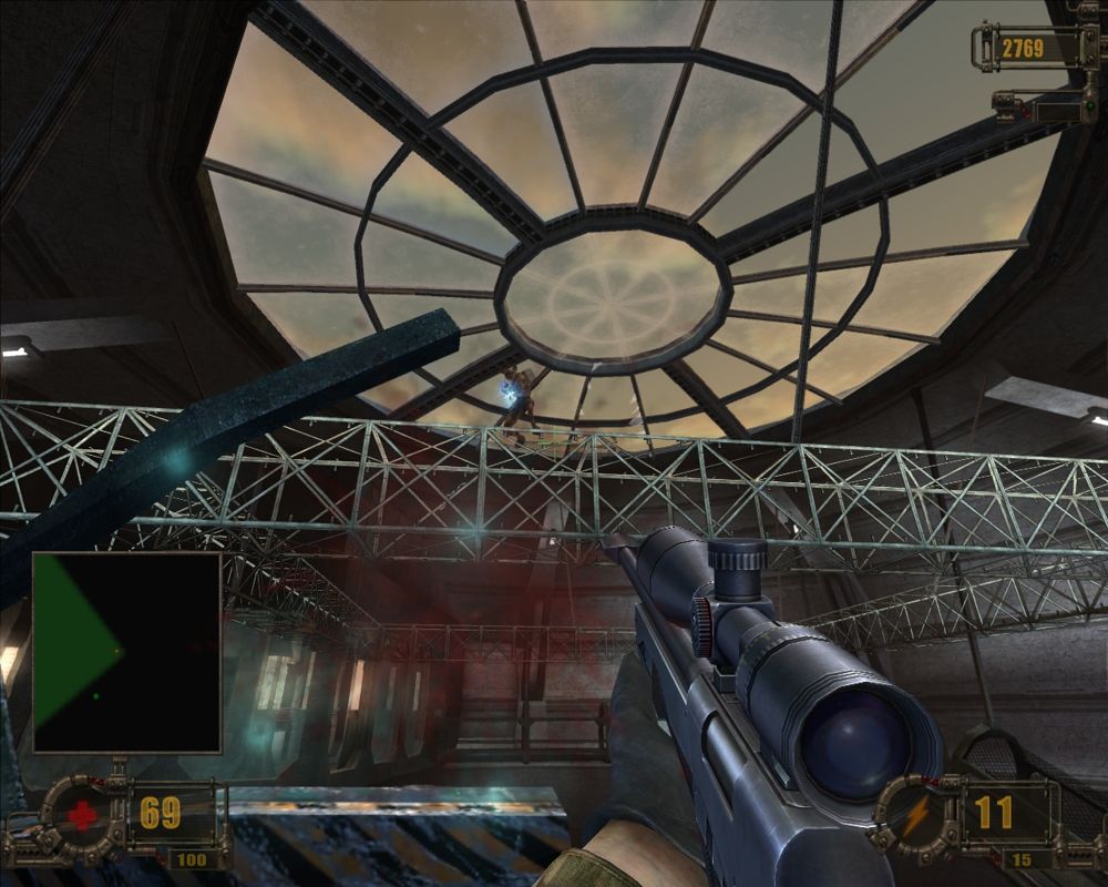 Vivisector: Beast Within (Windows) screenshot: Getting sniped at in the broadcast station.