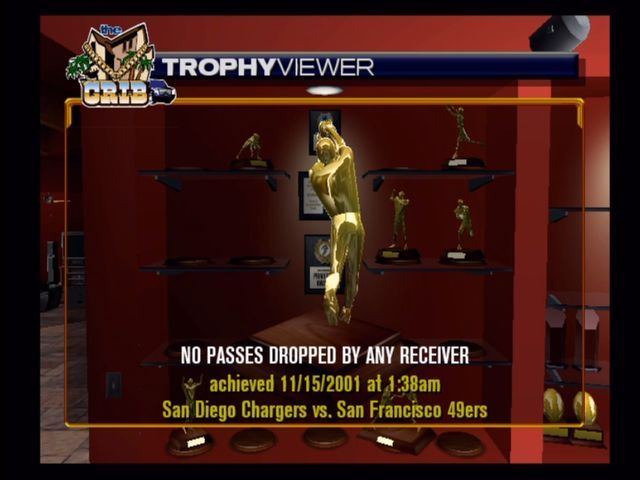 ESPN NFL Football (Xbox) screenshot: Trophies for achievements are displayed in the crib.
