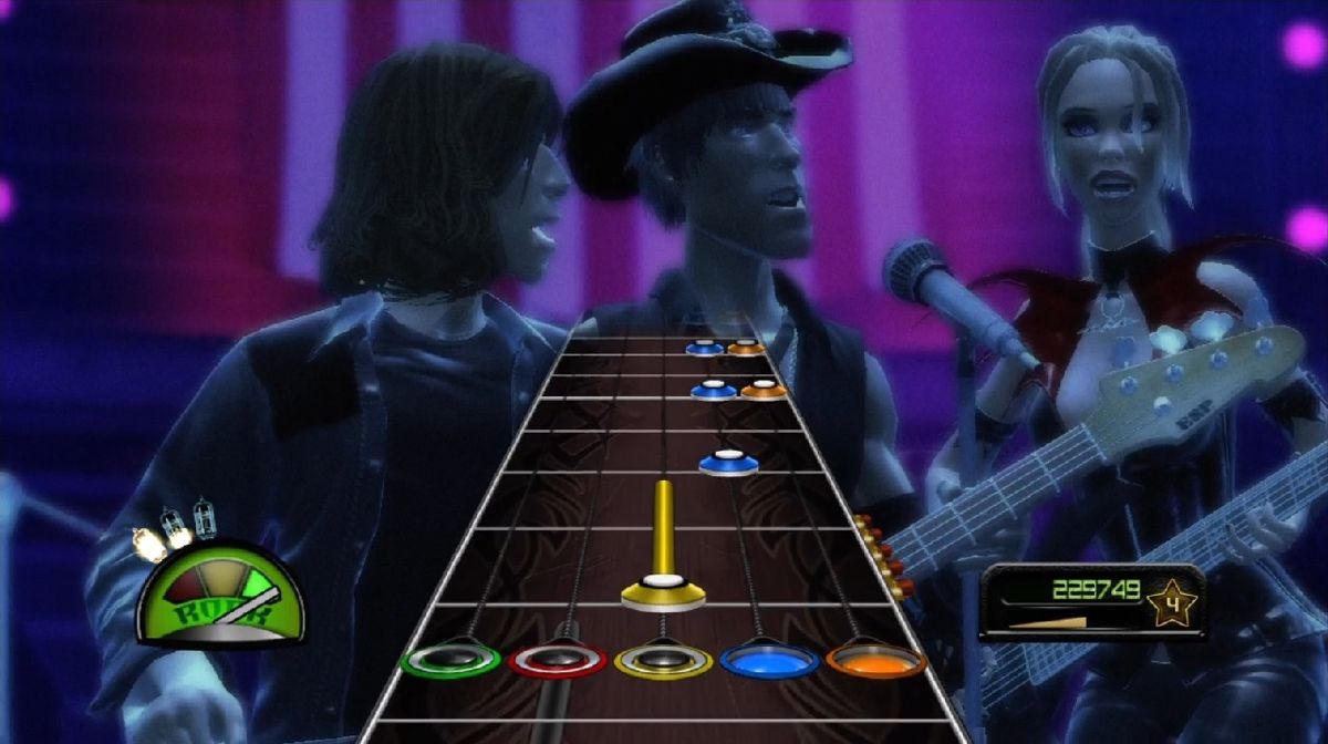 Guitar Hero: Metallica (Xbox 360) screenshot: The girl on the right is my avatar.