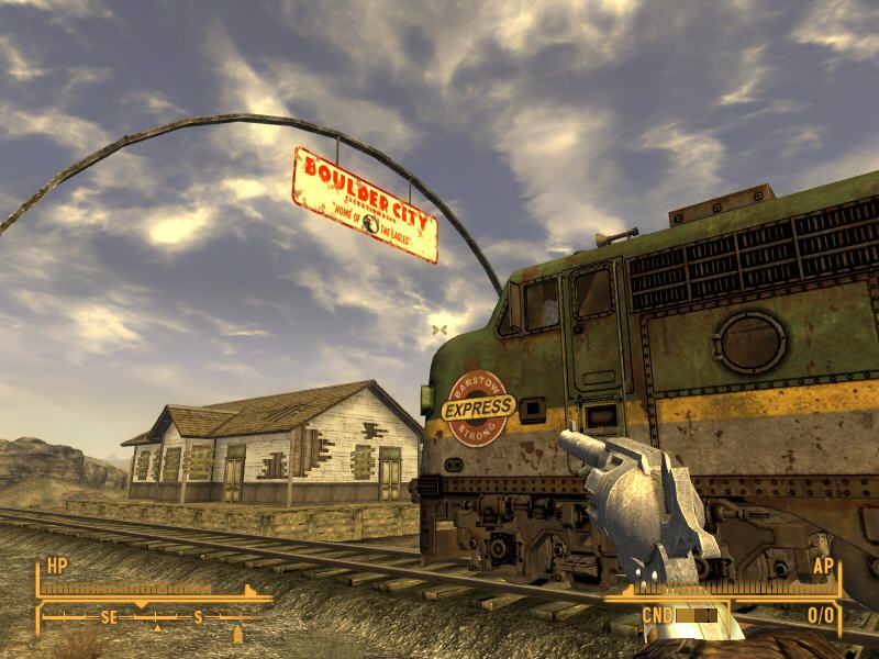 Fallout: New Vegas (Windows) screenshot: Howdy, pardner! A small-town train station and a magnum in my hand - it doesn't get any more Old West than that