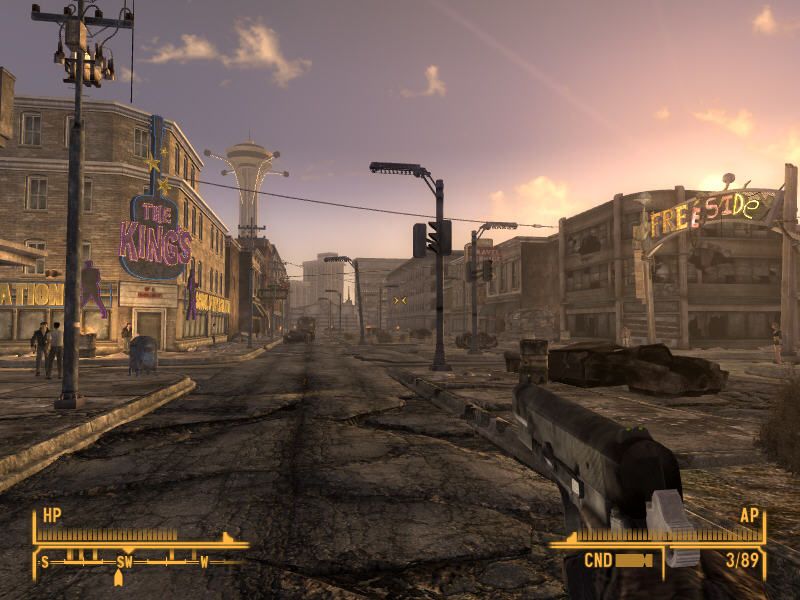 Fallout: New Vegas (Windows) screenshot: Finally, made it to the titular New Vegas! This is Freeside - the less fancy part of the city, but still considerably more alive than anything we've seen in Fallout 3