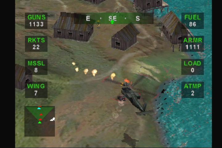 Nuclear Strike (PlayStation) screenshot: Puffs on the ground where our bullets are hitting.