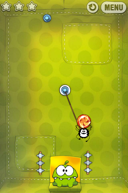 Cut the Rope (iPhone) screenshot: Level 2-9, the spider grabs the candy and gleefully escapes