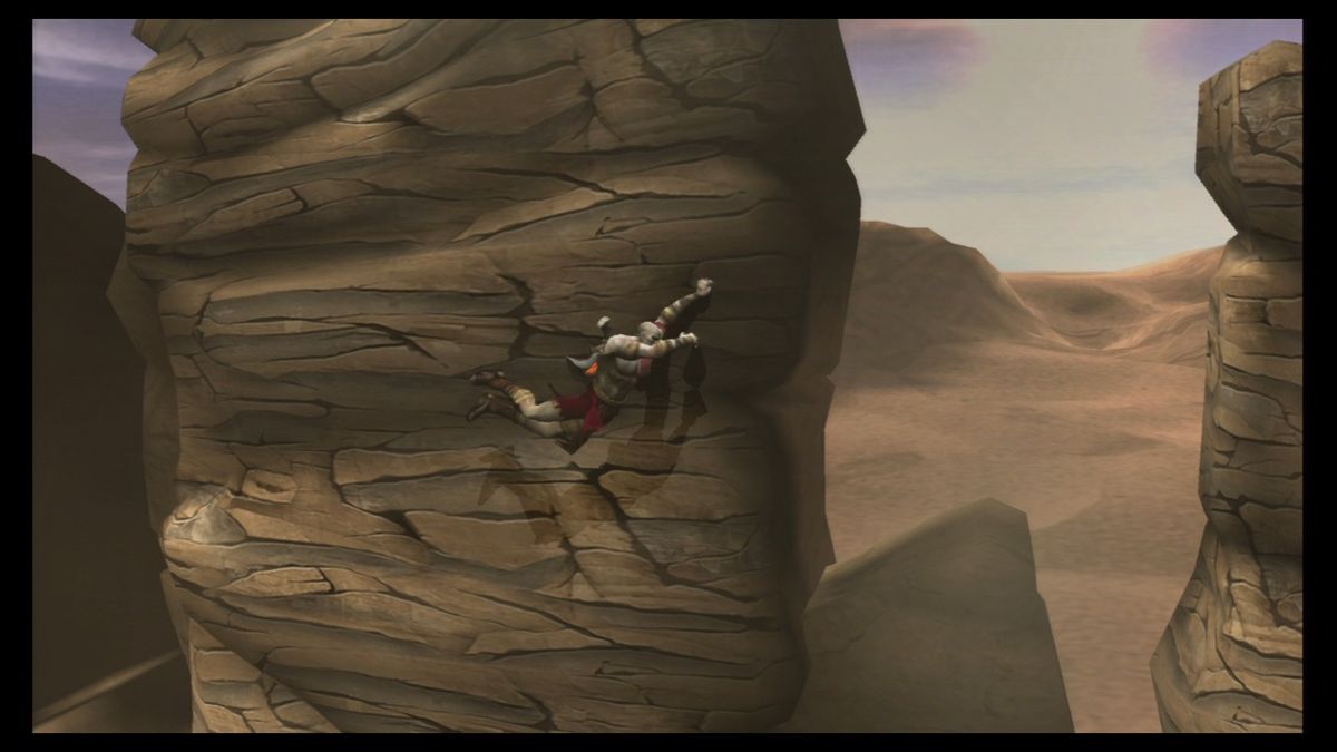 God of War (PlayStation 3) screenshot: Climbing and jumping to the other side.