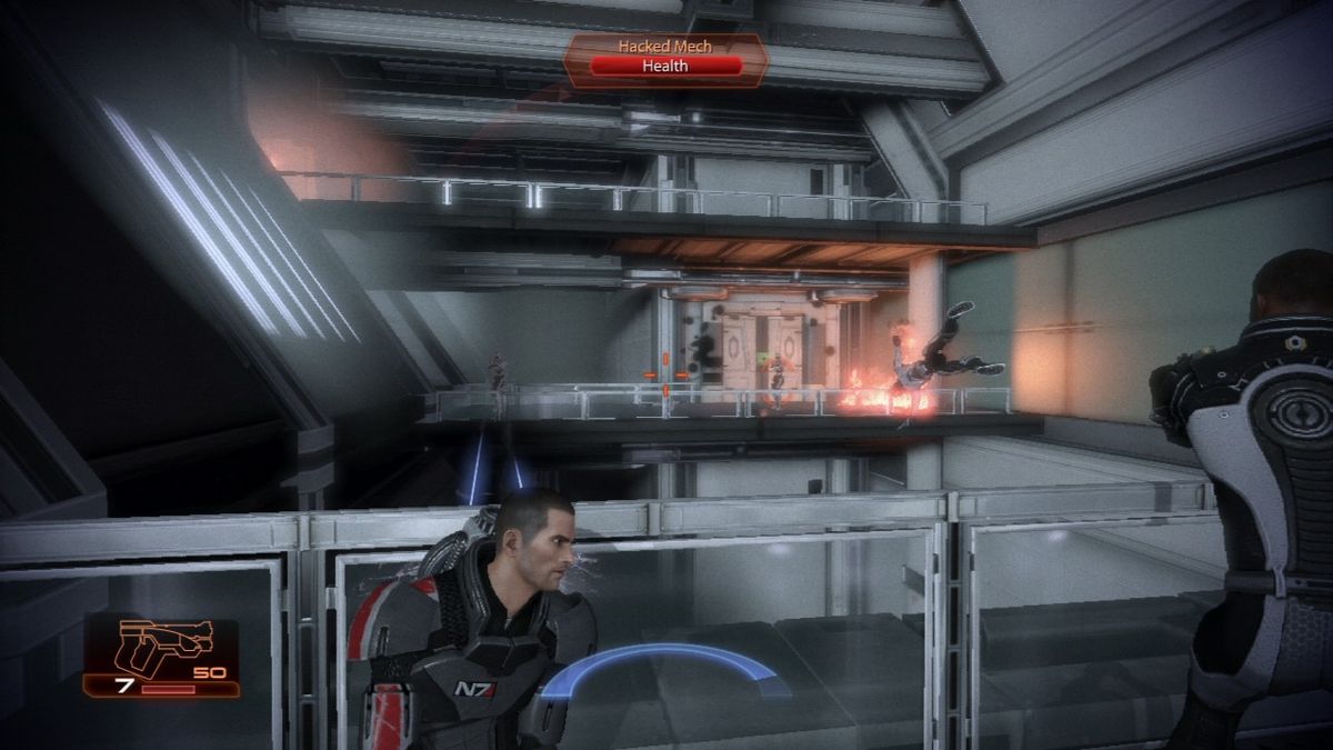 Mass Effect 2 (PlayStation 3) screenshot: Mass Effect 2 - Your squad members will aid you in battle automatically or you can give them commands