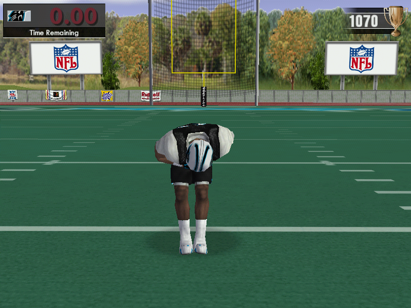 Madden NFL 2004 (Windows) screenshot: After winning a bronze trophy, Stephen Davis of the Carolina Panthers bows in celebration.