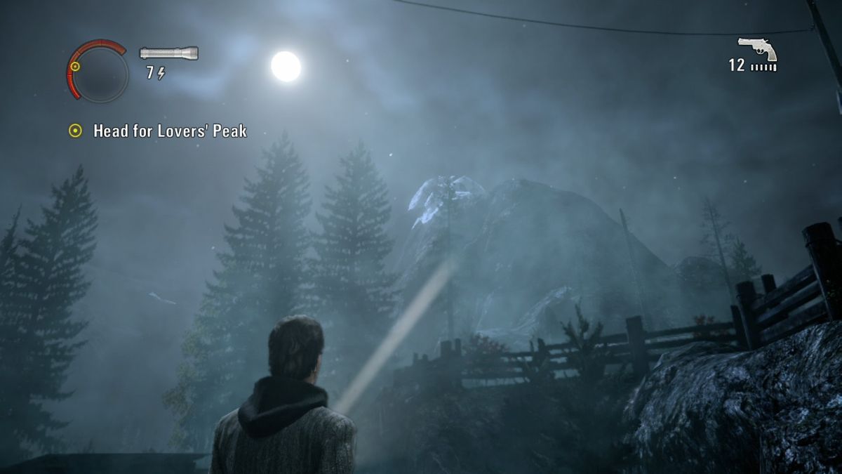 Alan Wake (Xbox 360) screenshot: There's a long way to reach that hill... and only way to reach it is through the dark woods.