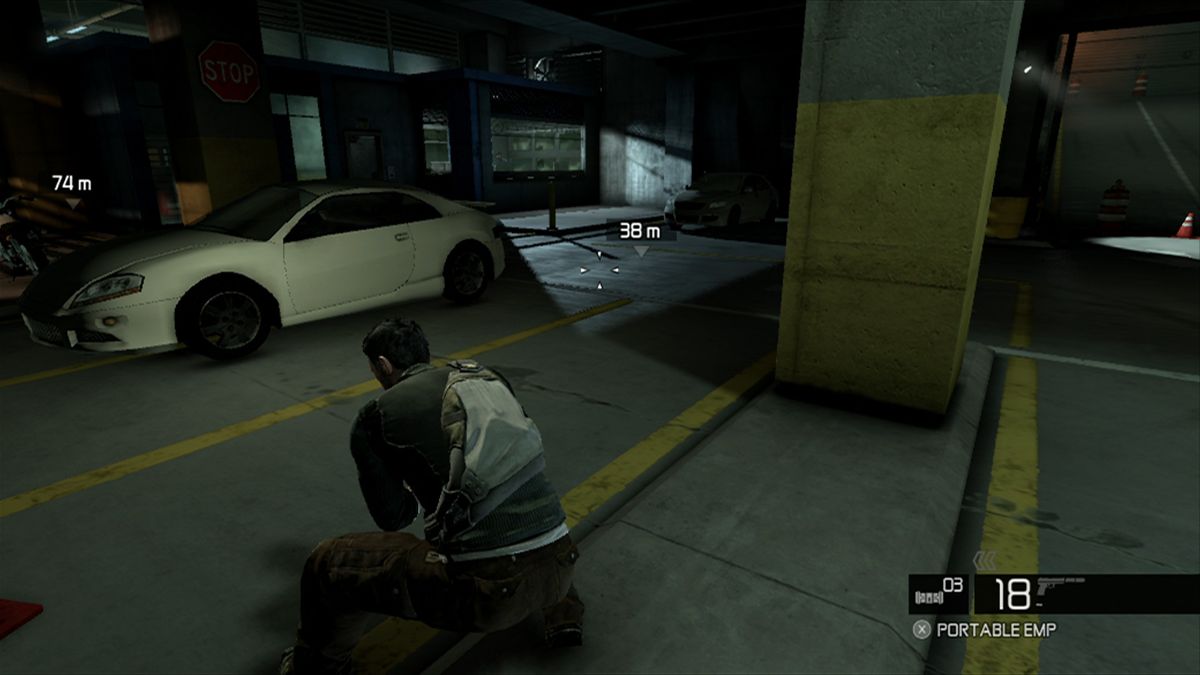 Tom Clancy's Splinter Cell: Conviction (Xbox 360) screenshot: Sneaking in the garage without being spotted by cameras or guards.