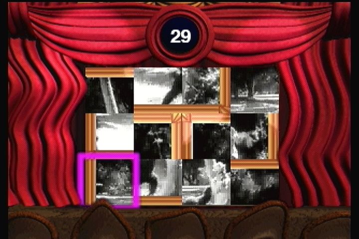 Twisted: The Game Show (3DO) screenshot: Sorting puzzle. The video plays live while you move the pieces around.