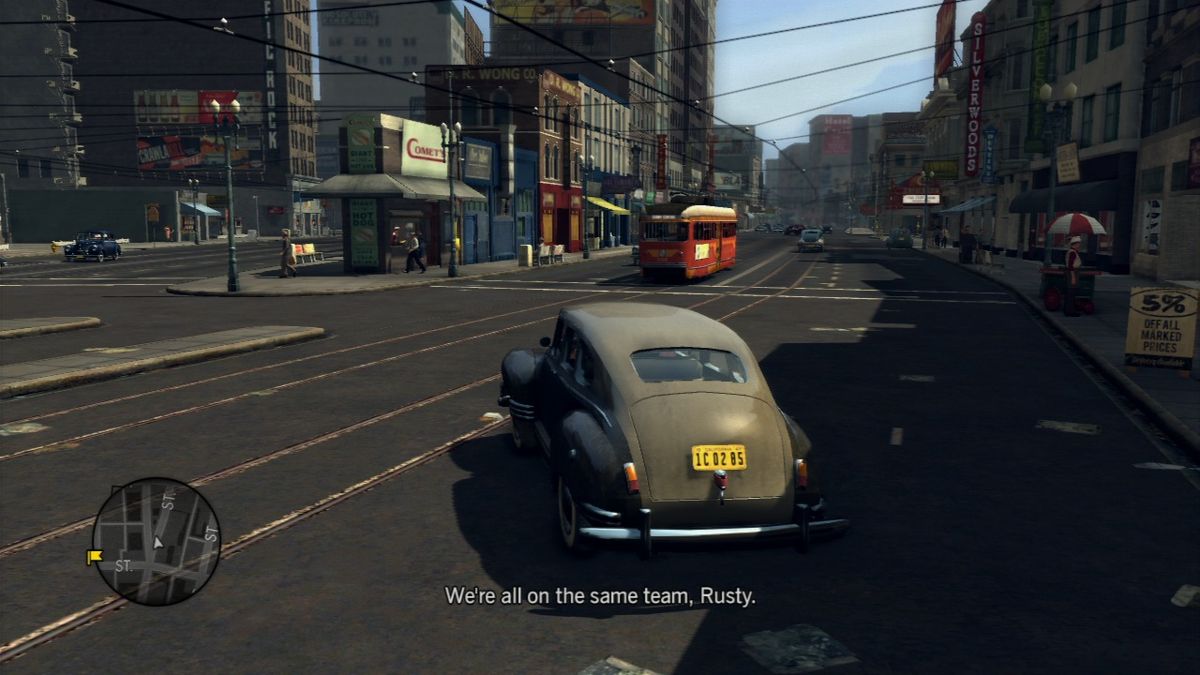 L.A. Noire (PlayStation 3) screenshot: Use your police siren to clear the road and avoid collisions when you're in a hurry.