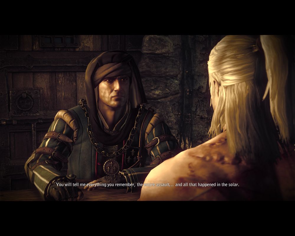 The Witcher 2: Assassins of Kings (Windows) screenshot: The dungeon master interrogates Geralt