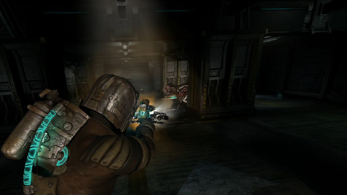 Dead Space 2 (PlayStation 3) screenshot: Lurkers hunt in packs... they'll peek behind the corner and then frantically dash at you.