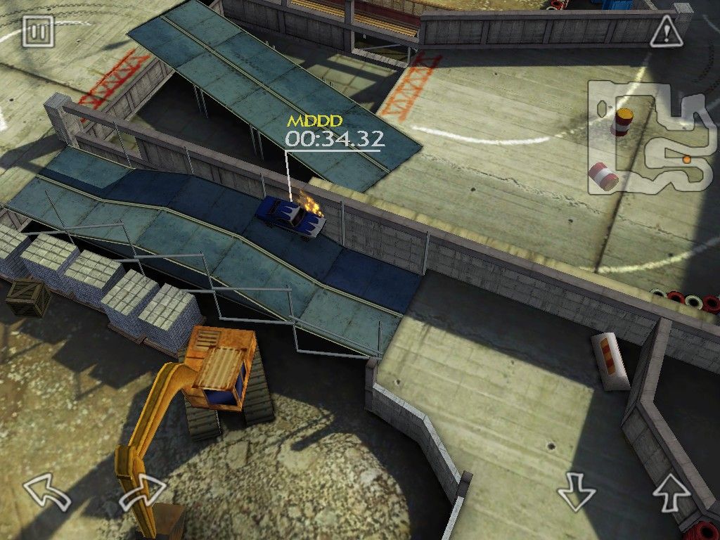 Reckless Racing (iPad) screenshot: Construction has some jumps - here my jump forces me into the wall complete with grinding metal flames