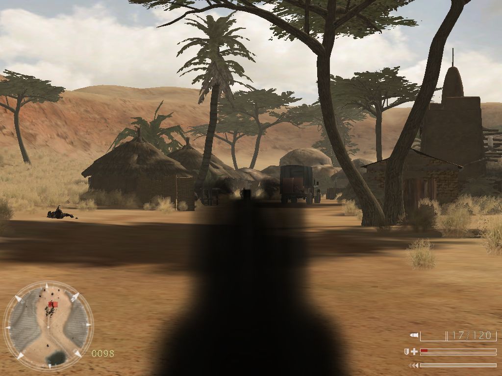Code of Honor: The French Foreign Legion (Windows) screenshot: A village. And there is the truck we´ve already spotted.
