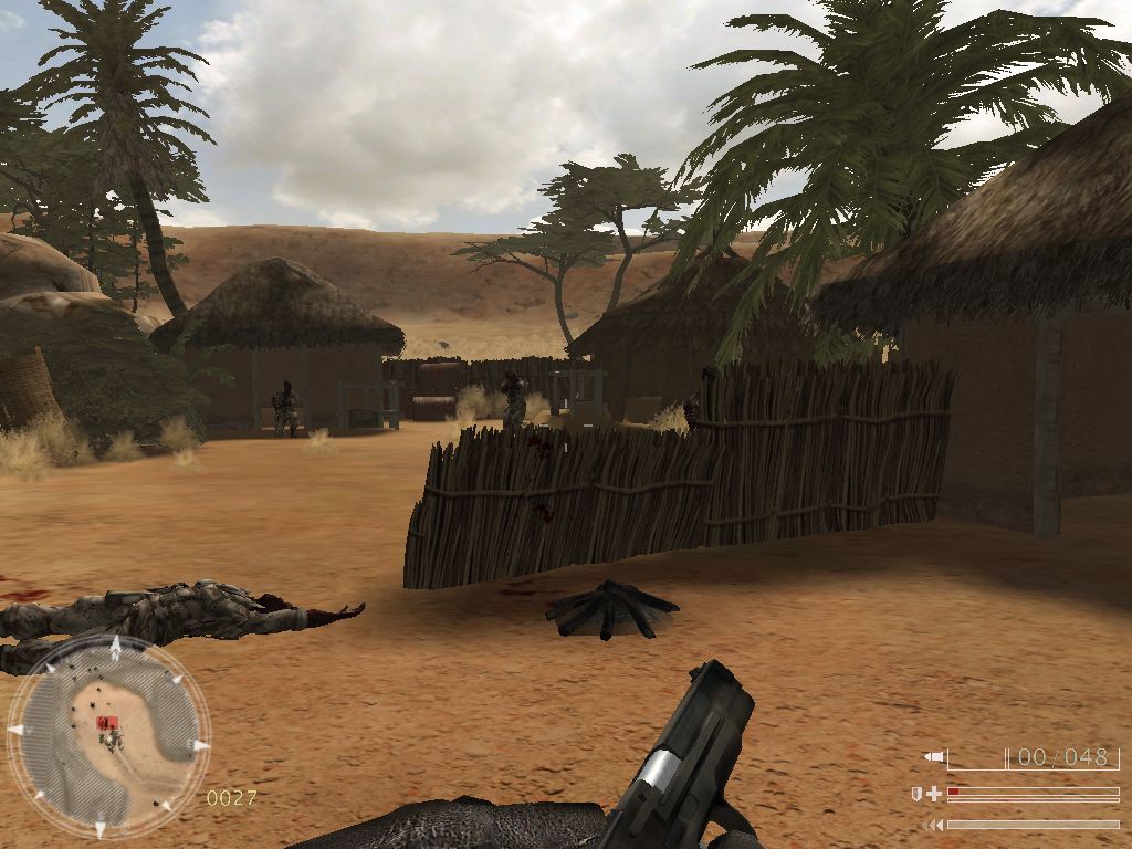 Code of Honor: The French Foreign Legion (Windows) screenshot: Storming the fuel dump. Reloading.