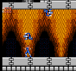 Strider (NES) screenshot: Inside a mountain, enemies leap from the ceiling