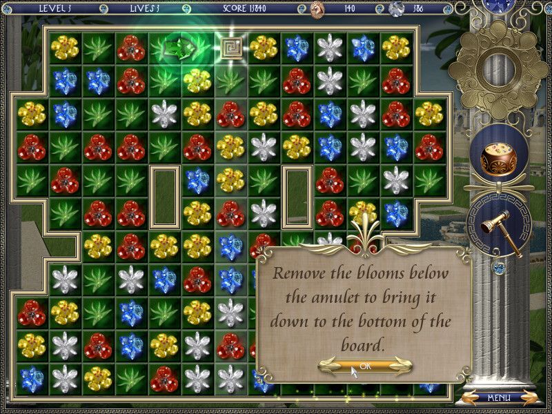 Babylonia (Windows) screenshot: The amulet is on the screen. You need to remove blooms to get the amulet to the bottom of the screen.