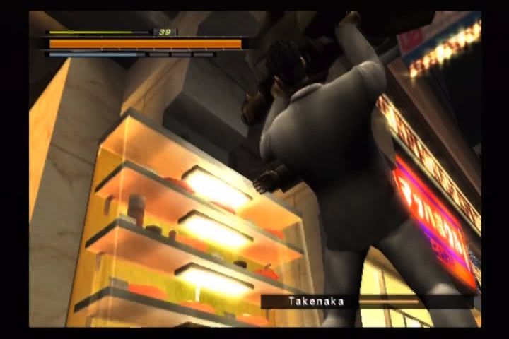 Yakuza 2 (PlayStation 2) screenshot: New HEAT attacks have been added. This thug's going for a ride...