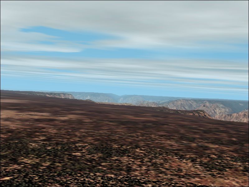 Microsoft Flight Simulator 2002 (Windows) screenshot: If preferred all instrumentation can be removed. A single key is used to toggle between these viewpoints