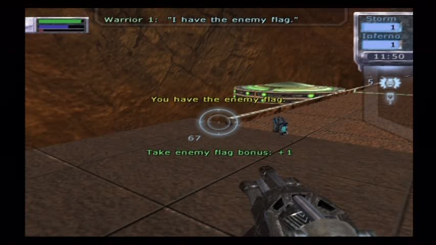 Tribes: Aerial Assault (PlayStation 2) screenshot: Got the flag! Time to run it back to base.