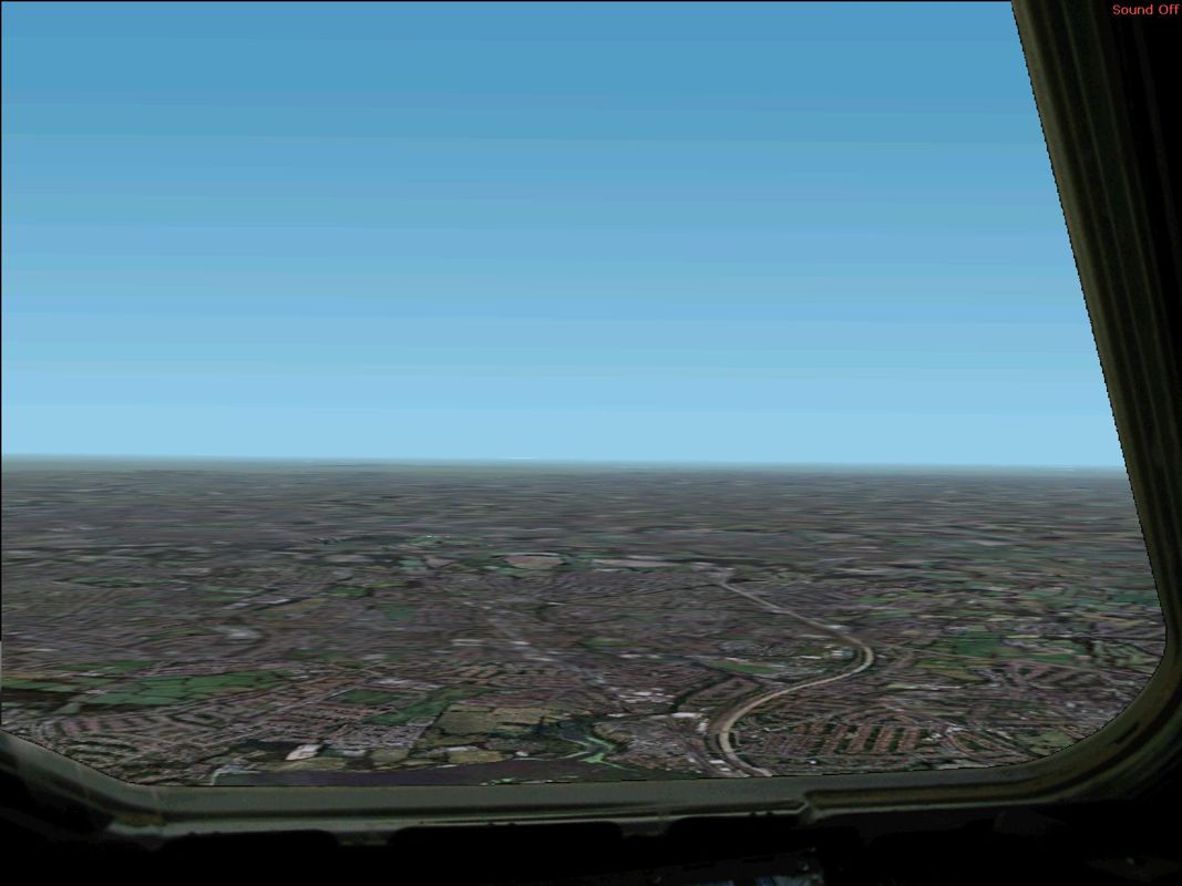 Concorde (Windows) screenshot: The pilot's view out of the left window, flying over London