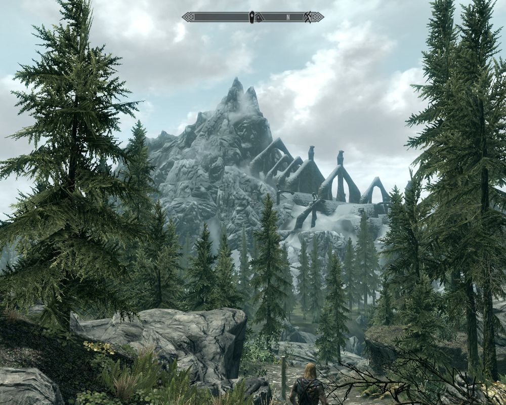 The Elder Scrolls V: Skyrim (Windows) screenshot: Forest and mountains - let us begin our travel!