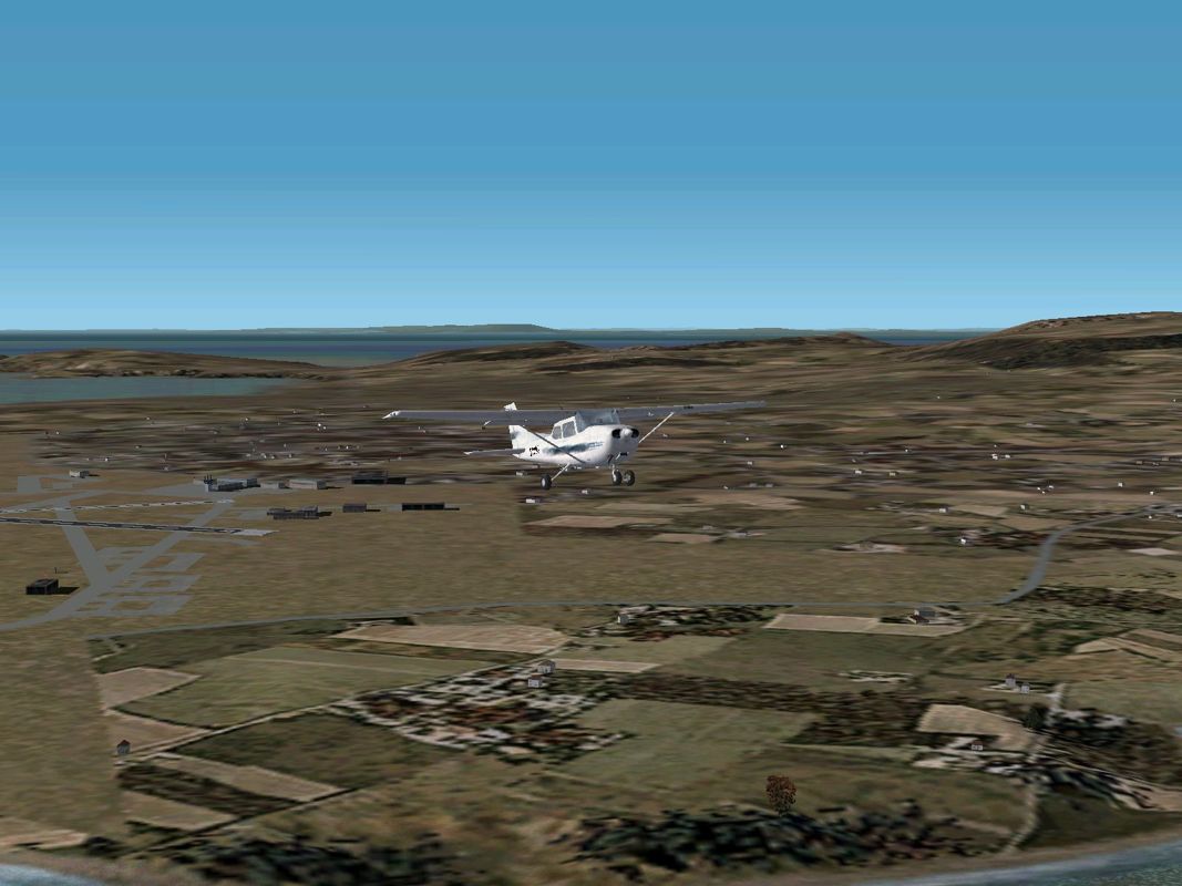 VFR Photographic Scenery: Northern England (Windows) screenshot: Taking off from the Isle of Man airport with the new scenery disabled