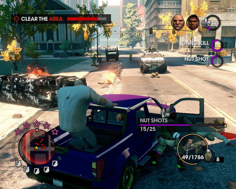 Saints Row: The Third (Windows) screenshot: The eloquent mutant Oleg rides in my truck; somebody tries to hijack it, but I keep setting people on fire with a fully upgraded SMG, watching out for that armored vehicle