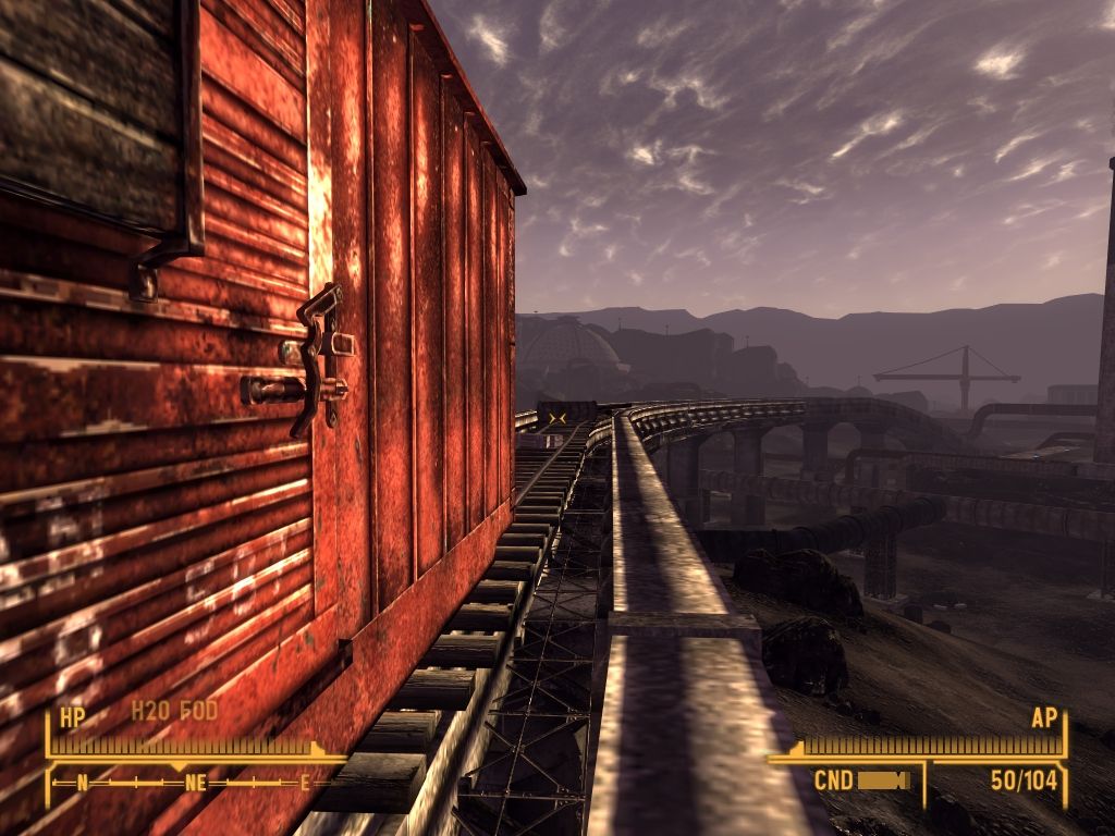 Fallout: New Vegas - Old World Blues (Windows) screenshot: Train cars that would never run along the rail anymore.