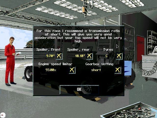 Team F1 (DOS) screenshot: This is the workshop, accessed via the coat in the main menu. Here the race manager is giving advice for the upcoming race.
