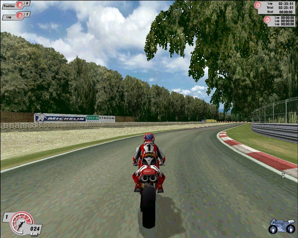 Superbike 2000 (Windows) screenshot: The scenery looks really good. Only when I played slowly, or when it's caught in a screenshot like this, did I realise how blocky it got close up. Take the overhanging tree for example.