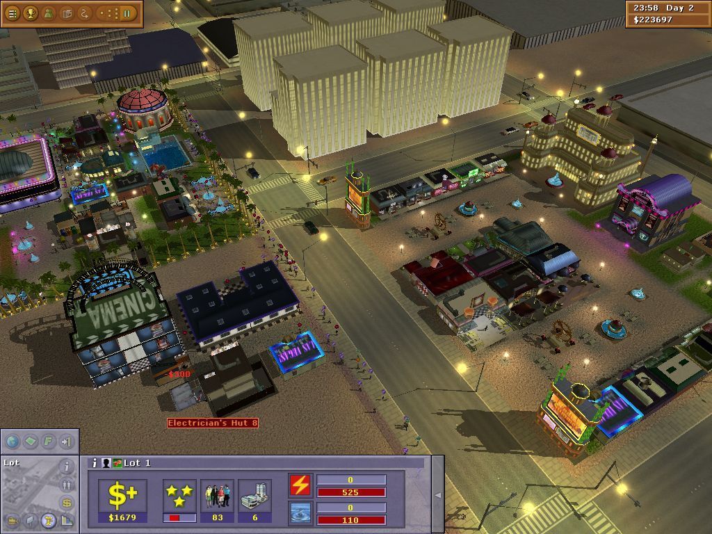 Vegas Tycoon (Windows) screenshot: The complex is growing. Here an electrician's hut has been placed as this worker is needed to maintain the cinema