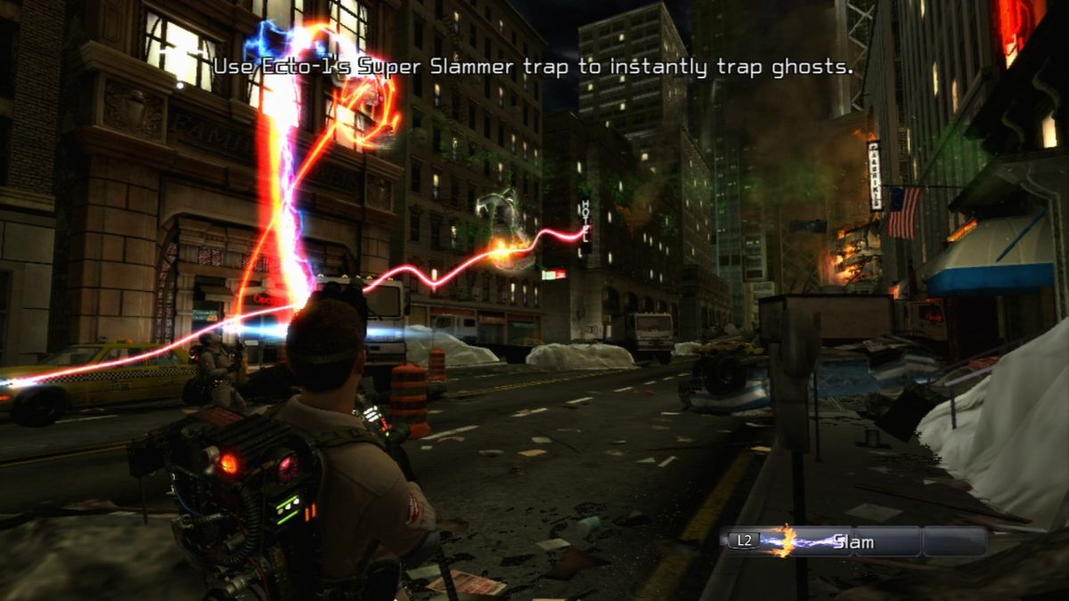 Ghostbusters: The Video Game (PlayStation 3) screenshot: Slam down the captured ghost to the ground to immobilize it temporarily so you can move them into the trap more easily.