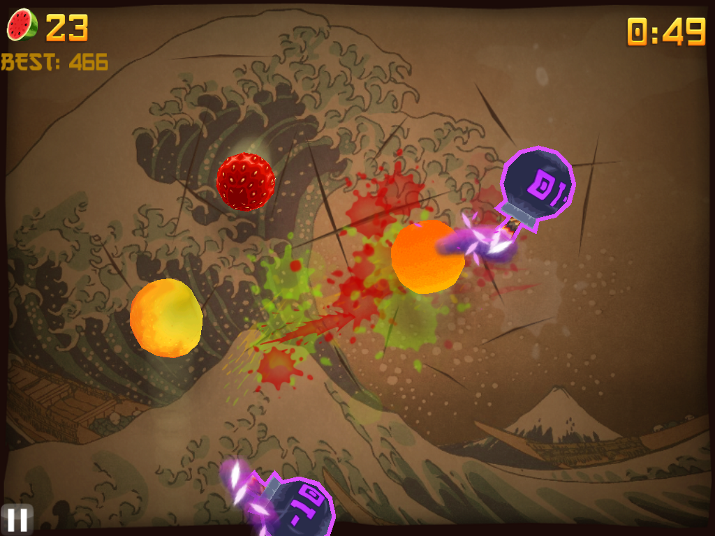 Fruit Ninja (iPad) screenshot: Watch out for the bombs in Arcade mode