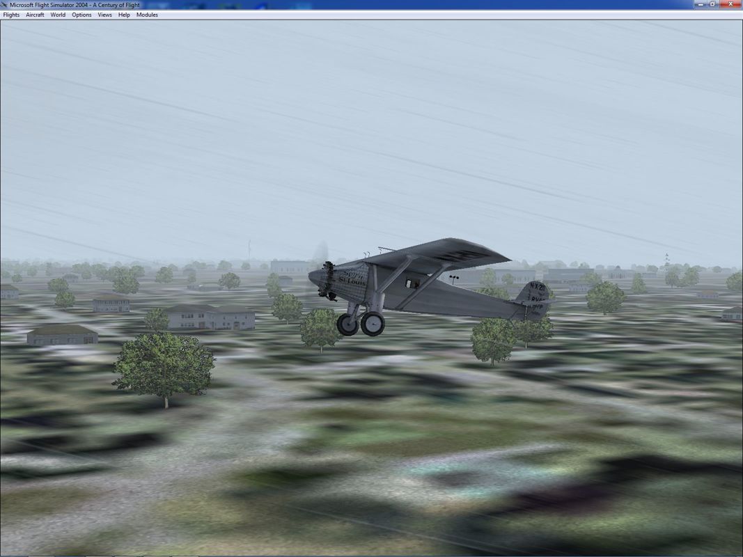Microsoft Flight Simulator 2004: A Century of Flight (Windows) screenshot: An in-flight view of the Spirit of St Louis. The player can move around the plane and view from any angle