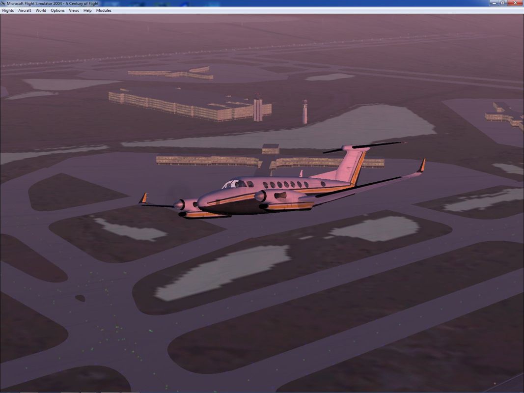 Microsoft Flight Simulator 2004: A Century of Flight (Windows) screenshot: The simulator features two Beechcraft planes, the Baron 58 and this, the Beechcraft King Air 350 seen here shortly after taking off from Orlando airport in Florida at dusk