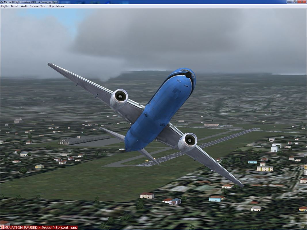 Microsoft Flight Simulator 2004: A Century of Flight (Windows) screenshot: The Boeing 777-300 in Pacifica livery climbing away from Hawaii's Hilo airport