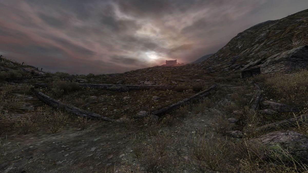Dear Esther (Windows) screenshot: A small cottage appears in the distance