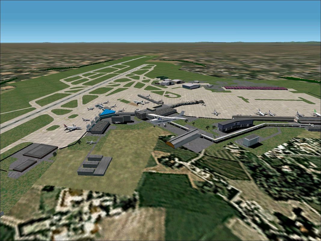 World Airports (Windows) screenshot: Flying low over the newly enhanced Manchester airport.