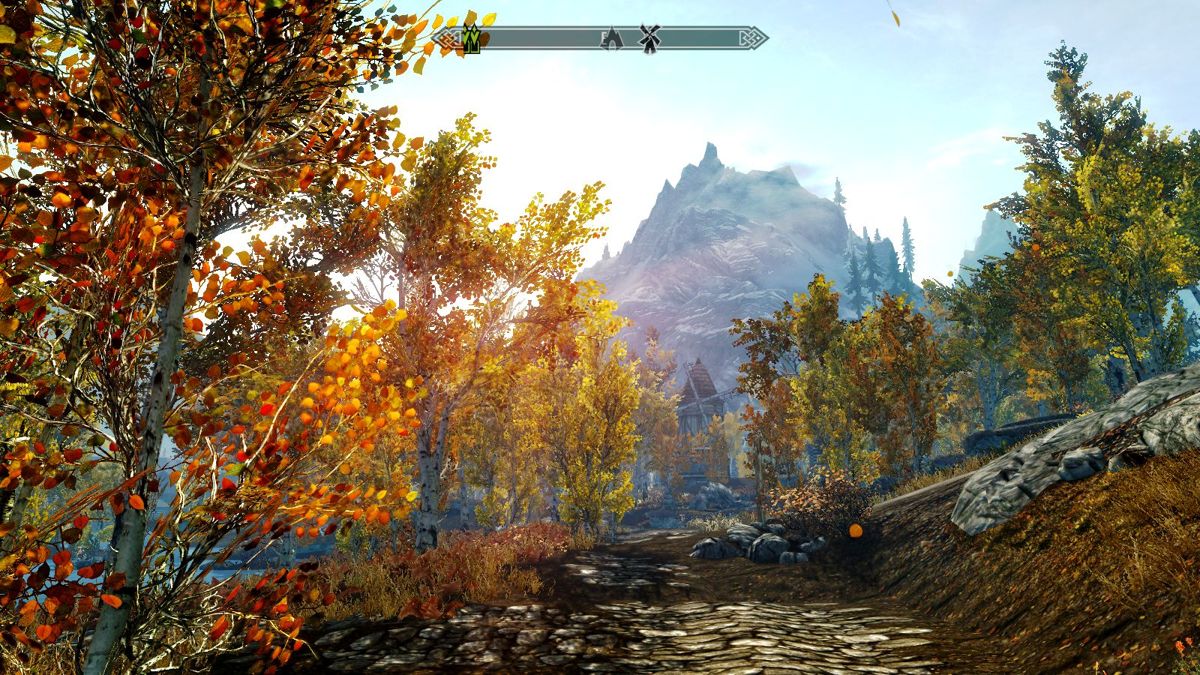 The Elder Scrolls V: Skyrim (Windows) screenshot: The mill at the end of the road. Maybe they serve breakfast there!