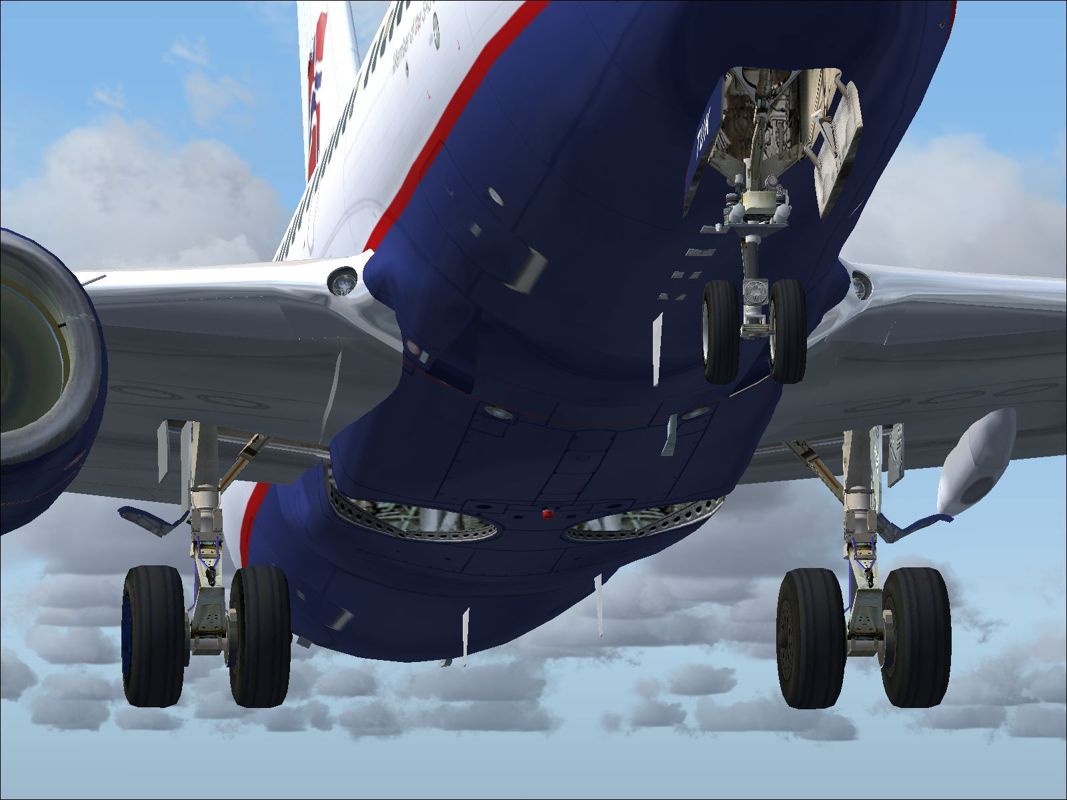 737 NG: 600 / 700 (Windows) screenshot: Just after takeoff. Look at the detailing inside the wheel wells!