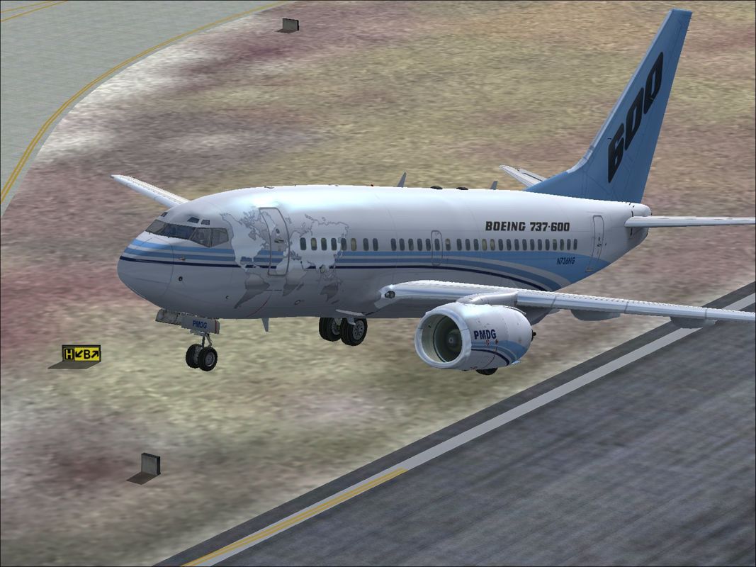 737 NG: 600 / 700 (Windows) screenshot: The 737 600 in PDMG livery at take-off