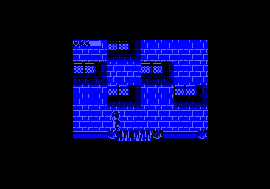 The Blues Brothers (Amstrad CPC) screenshot: The ground is slippery, making this harder