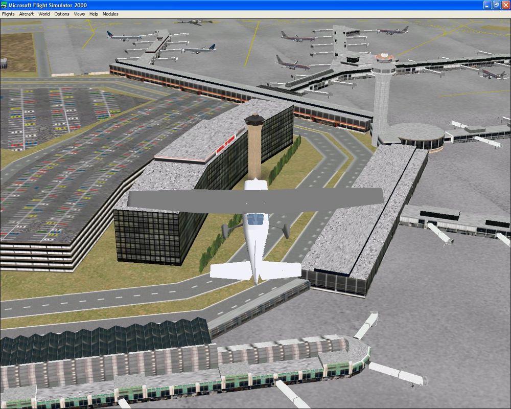 Airport 2000: Volume 2 (Windows) screenshot: Flying over the enhanced Chicago O'Hare Airport. Here the line of trees and the car park sort of spoil the effect a bit.